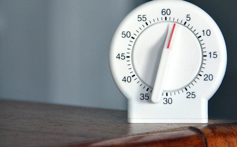 black and white analog egg timer